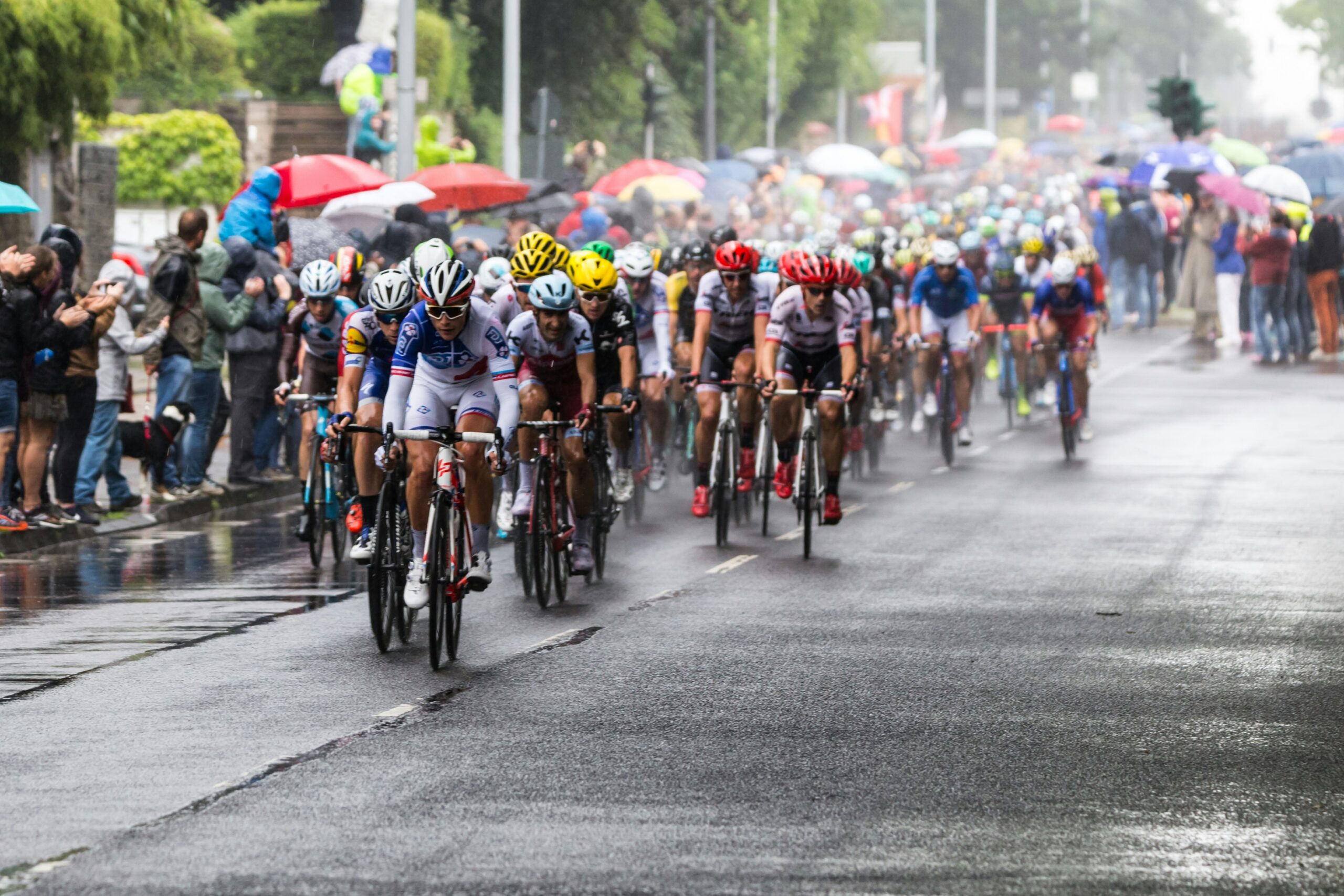 The peloton riding in a rainy day